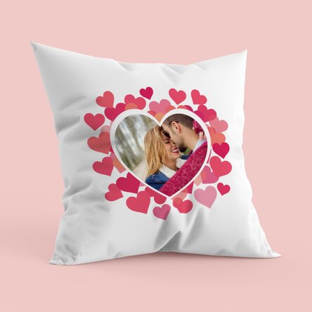 Personalised cushion with a photo in the shape of a pink heart
