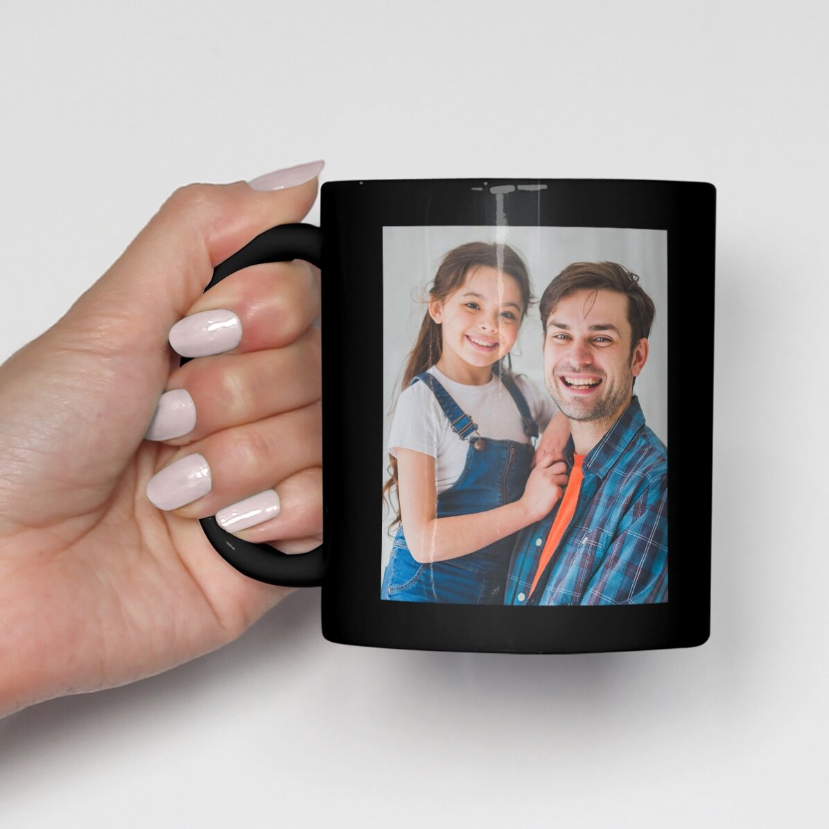 Personalised black mug with two photos