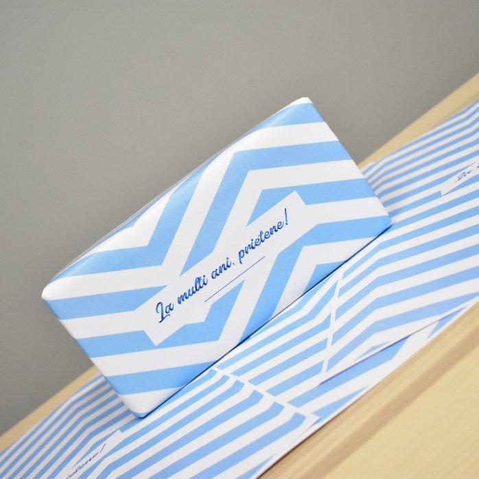 Personalised gift wrapping paper - blue stripes pattern with text in border