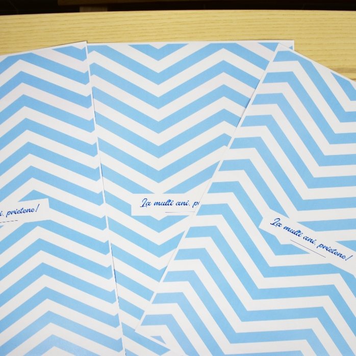 Personalised gift wrapping paper - blue stripes pattern with text in border