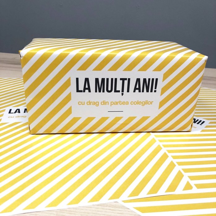 Personalised gift wrapping paper - yellow stripes pattern, with text in a border