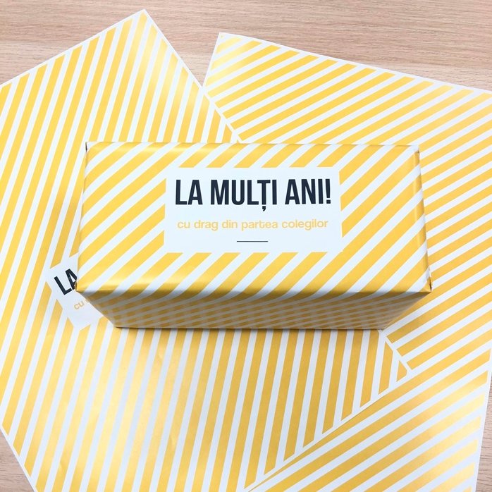 Personalised gift wrapping paper - yellow stripes pattern, with text in a border