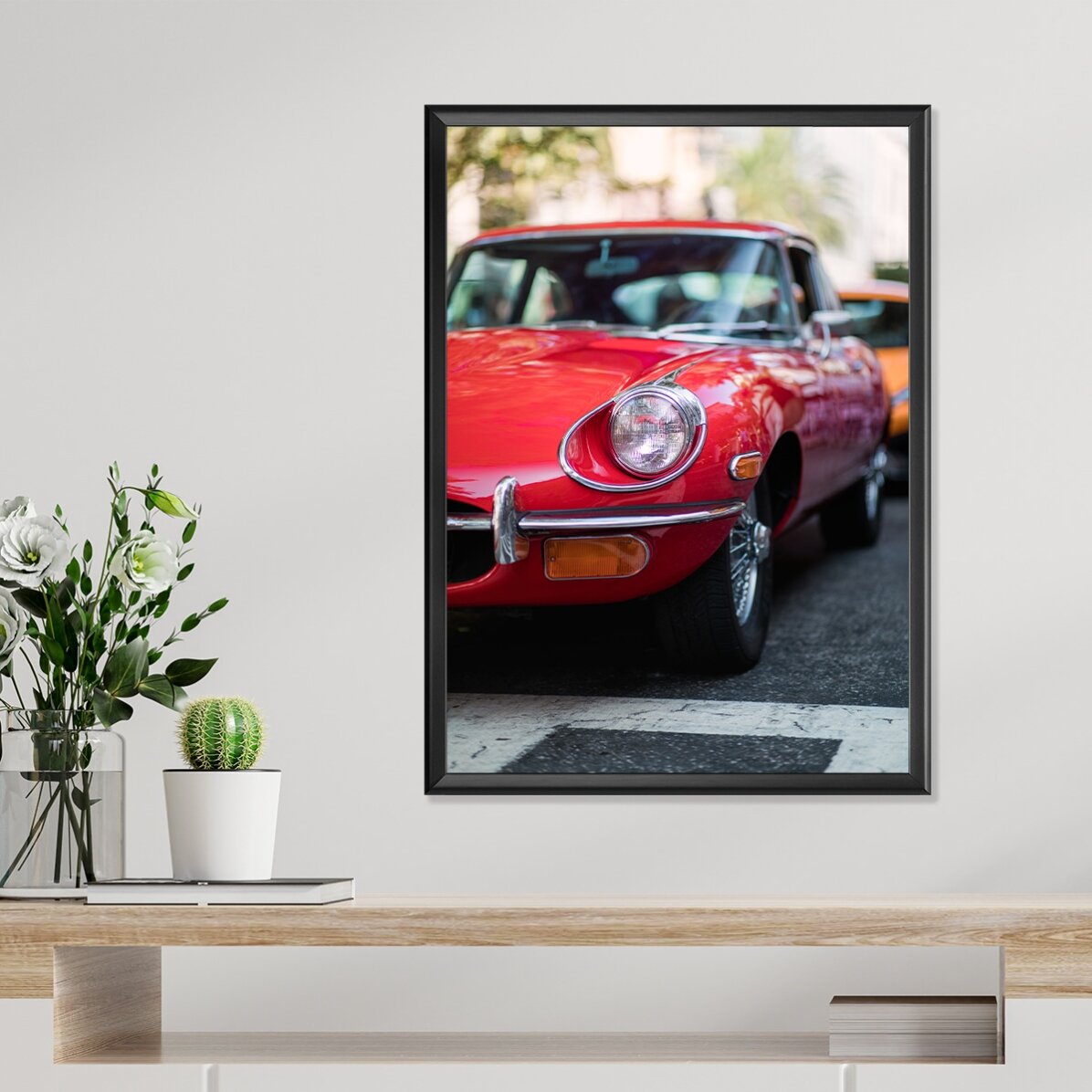 Plakat z czerwonym samochodem w stylu vintage